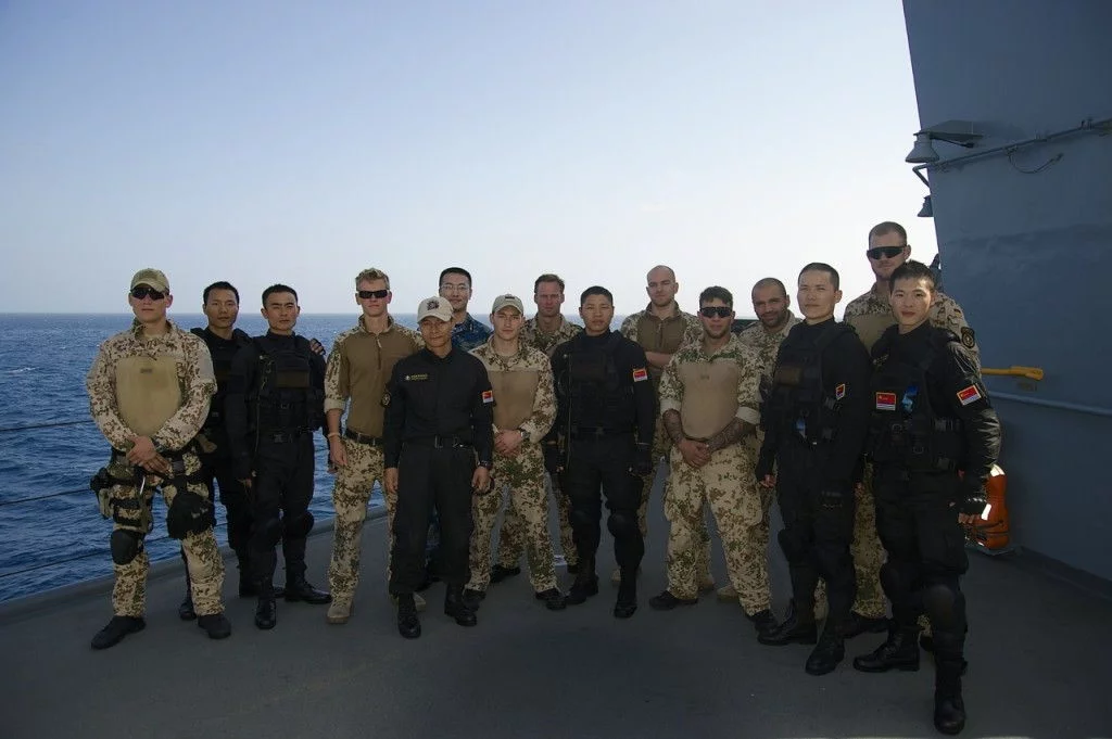 Les équipes de visite chinoise et allemande