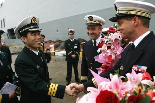 Accueil par les autorités Chinoises